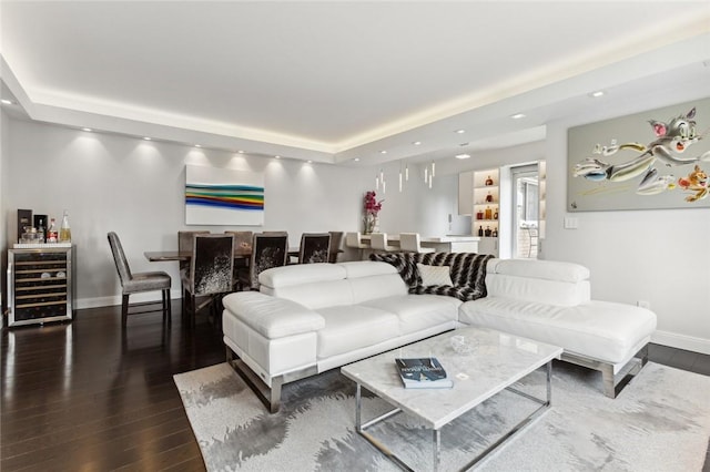 205 E 63rd St Phe, Phe New York Manhattan, NY 10065 - living room with beverage cooler, a tray ceiling, baseboards, recessed lighting, and wood finished floors