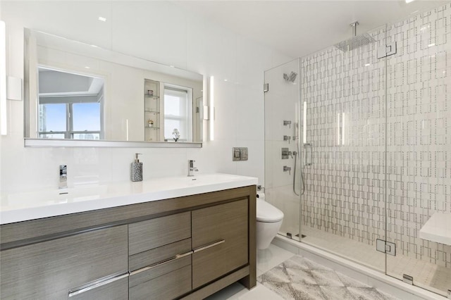 205 E 63rd St Phe, Phe New York Manhattan, NY 10065 - bathroom with a shower stall, double vanity, and toilet