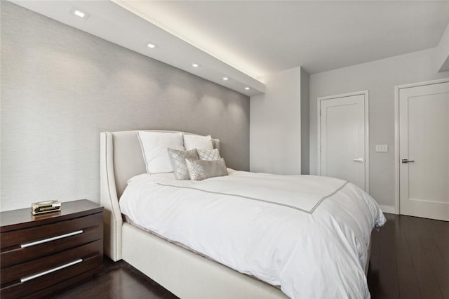 205 E 63rd St Phe, Phe New York Manhattan, NY 10065 - bedroom with dark wood-type flooring, recessed lighting, and baseboards