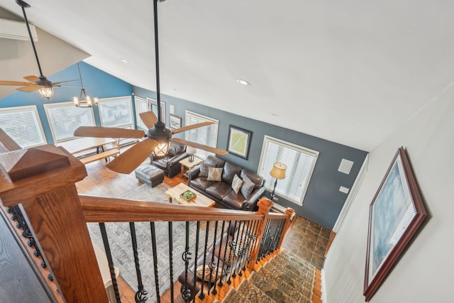 49 Brook Trl, Greenwood Lake, NY 10925 - stairs featuring ceiling fan, wood finished floors, lofted ceiling, a chandelier, and recessed lighting