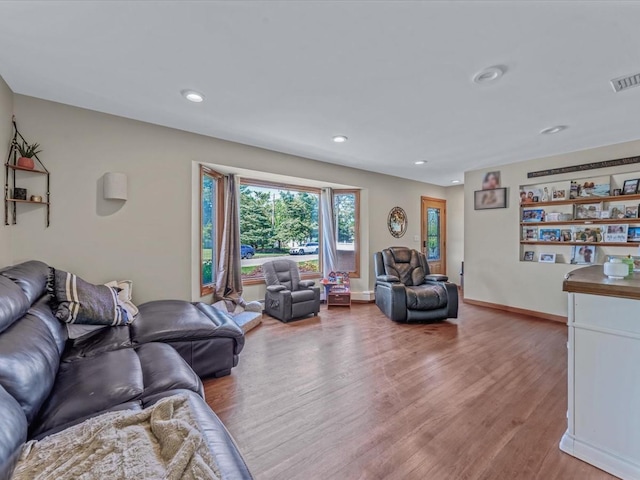 4 Whitebirch Ln, Commack, NY 11725 - living room featuring light wood-style floors and recessed lighting