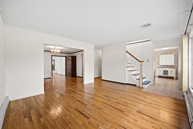 21 Arizona Ave, Syosset, NY 11791 - unfurnished living room with a baseboard radiator, stairs, a chandelier, crown molding, and light wood-type flooring
