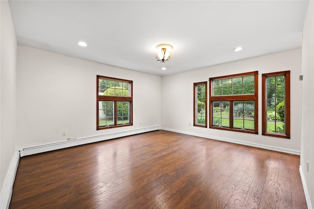 21 Arizona Ave, Syosset, NY 11791 - empty room featuring a baseboard radiator, hardwood / wood-style floors, baseboards, and recessed lighting