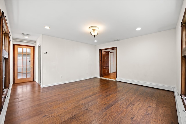 21 Arizona Ave, Syosset, NY 11791 - unfurnished room featuring dark wood-type flooring, baseboards, recessed lighting, and baseboard heating