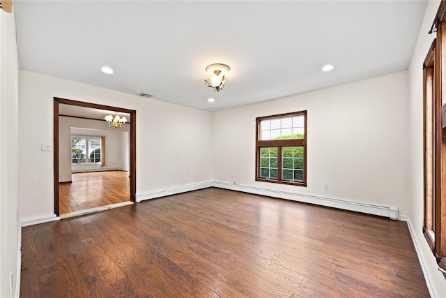 21 Arizona Ave, Syosset, NY 11791 - empty room featuring a chandelier, dark wood finished floors, recessed lighting, baseboards, and a baseboard radiator