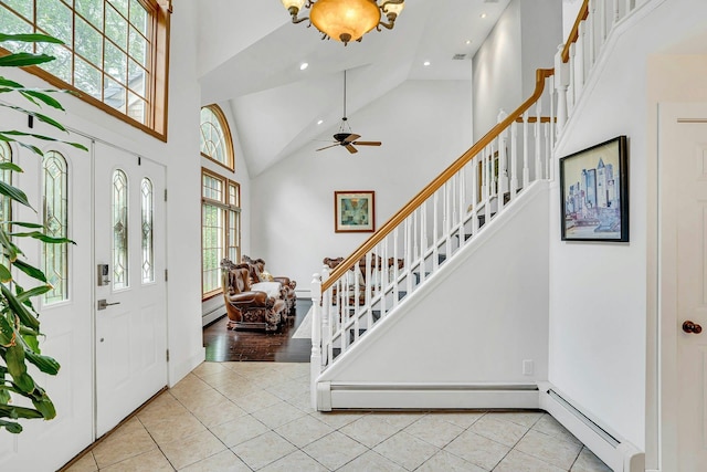 1138 Carlls Straight Path, Dix Hills, NY 11746 - entrance foyer with light tile patterned floors, stairs, recessed lighting, high vaulted ceiling, and a ceiling fan