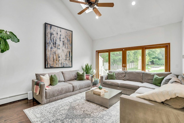 1138 Carlls Straight Path, Dix Hills, NY 11746 - living area with high vaulted ceiling, wood finished floors, french doors, a ceiling fan, and a baseboard radiator