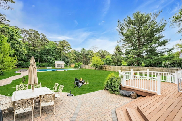 1138 Carlls Straight Path, Dix Hills, NY 11746 - view of patio / terrace with a wooden deck, outdoor dining area, and view of wooded area
