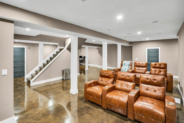 1138 Carlls Straight Path, Dix Hills, NY 11746 - cinema room featuring finished concrete floors, recessed lighting, and baseboards