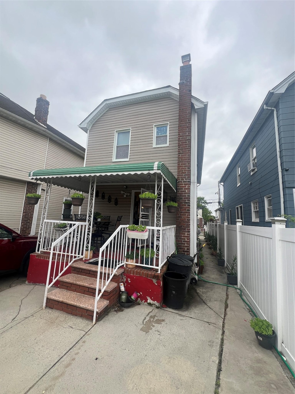 11845 218th St, Cambria Heights, NY 11411 - view of front of home with covered porch