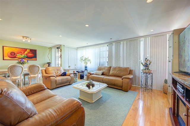 10-11 162nd St Unit 7A, Beechhurst, NY 11357 - living room with light wood-style floors and recessed lighting