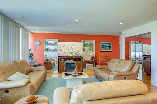 10-11 162nd St Unit 7A, Beechhurst, NY 11357 - living room featuring light wood-style floors and recessed lighting