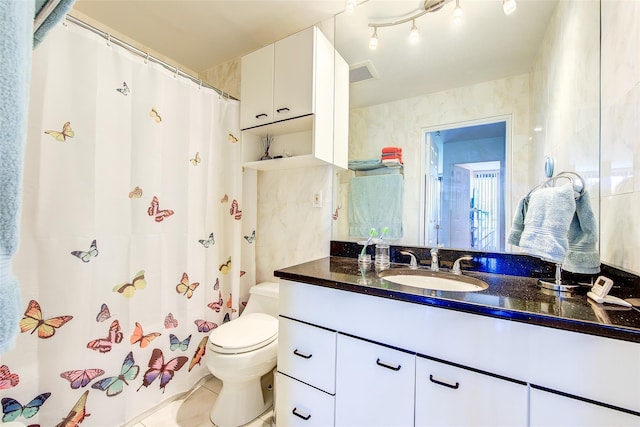 10-11 162nd St Unit 7A, Beechhurst, NY 11357 - bathroom with toilet, vanity, tile patterned flooring, and curtained shower