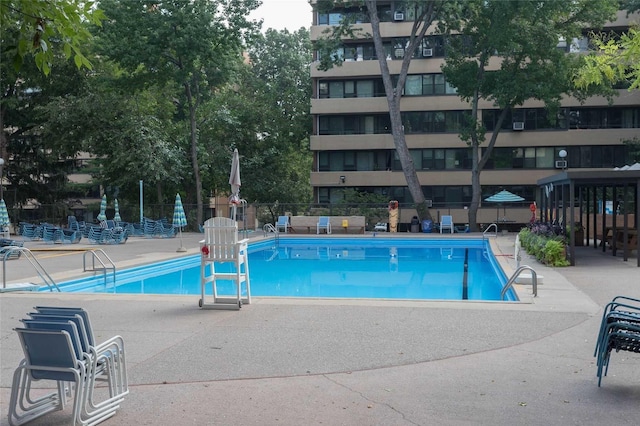 10-11 162nd St Unit 7A, Beechhurst, NY 11357 - community pool featuring a patio area