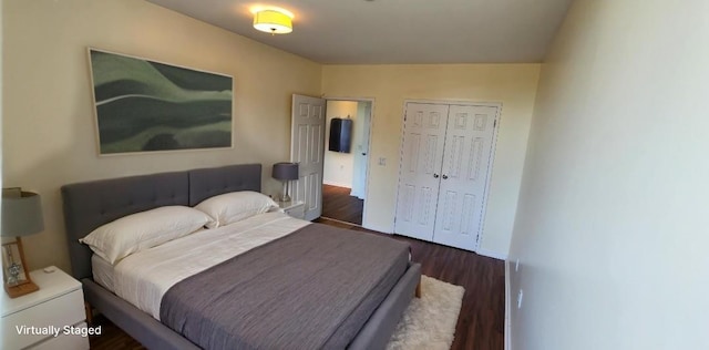 355 Kings Hwy Unit 5C, Brooklyn, NY 11223 - bedroom with dark wood-style floors, a closet, and baseboards