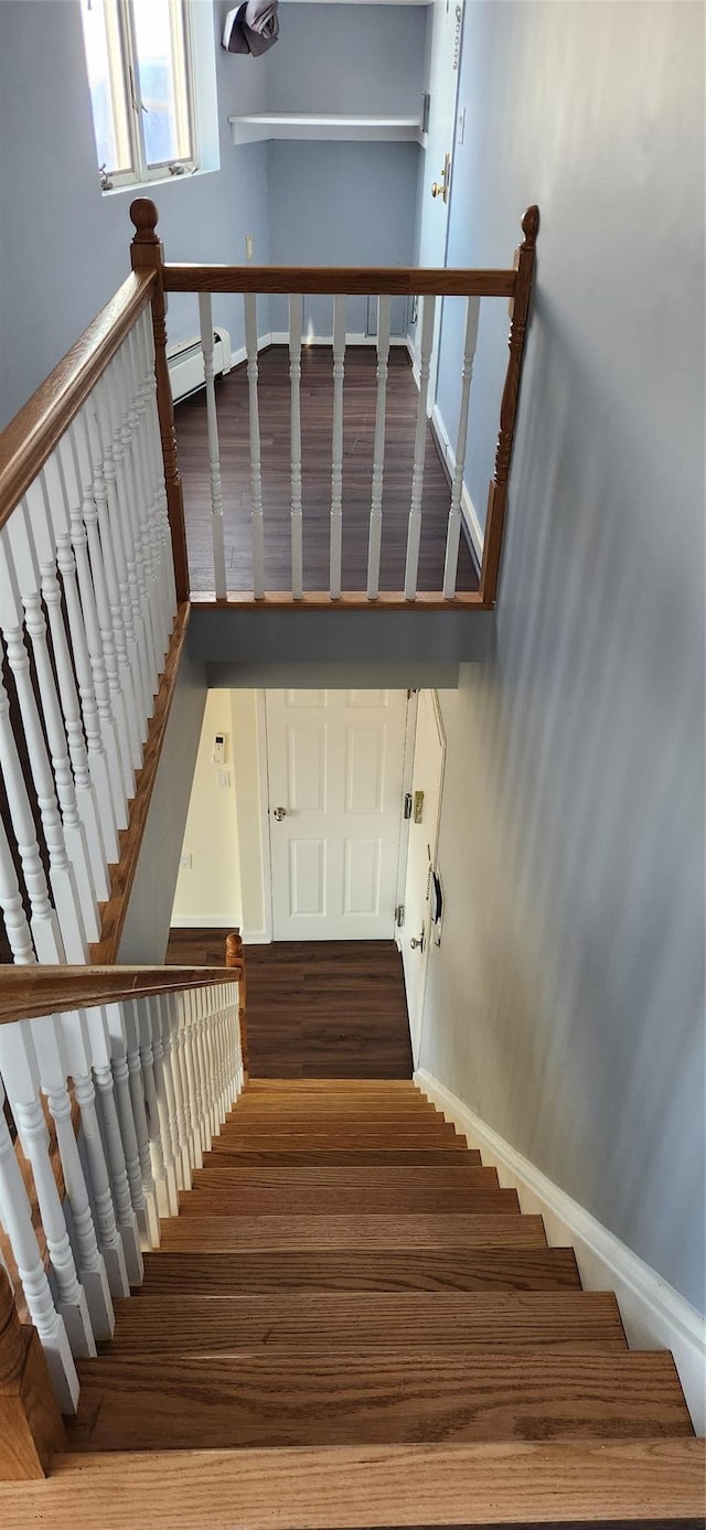 355 Kings Hwy Unit 5C, Brooklyn, NY 11223 - staircase featuring wood finished floors and baseboards