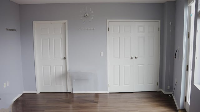 355 Kings Hwy Unit 5C, Brooklyn, NY 11223 - unfurnished bedroom featuring wood finished floors and baseboards