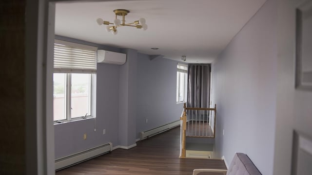 355 Kings Hwy Unit 5C, Brooklyn, NY 11223 - corridor featuring a baseboard heating unit, a wall mounted AC, dark wood-style floors, and a chandelier
