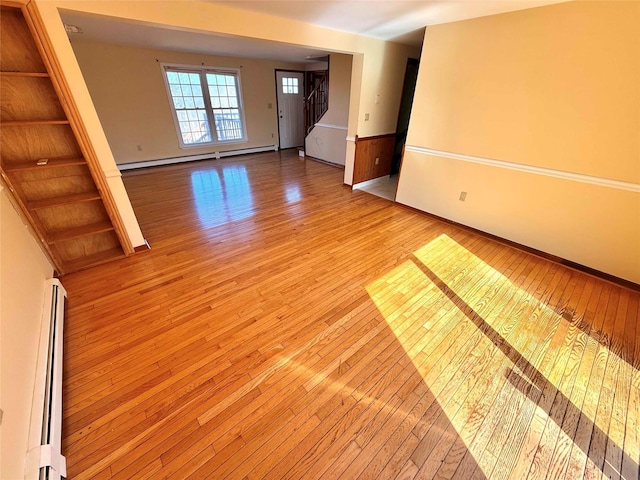 118 White Brg, Middletown, NY 10940 - empty room featuring light wood-style floors, a baseboard heating unit, and baseboards