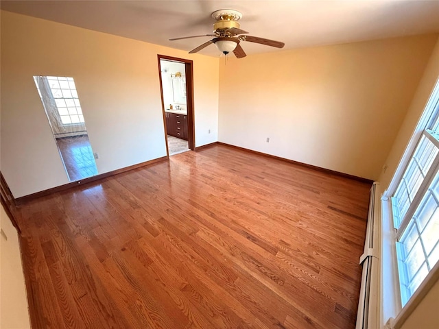 118 White Brg, Middletown, NY 10940 - spare room featuring healthy amount of natural light, wood finished floors, a ceiling fan, and baseboards