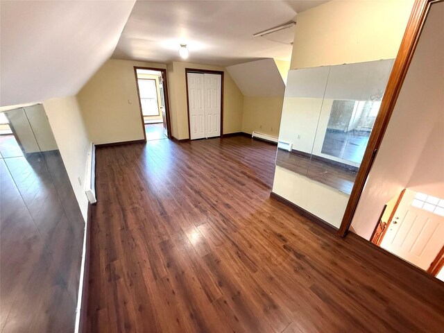 118 White Brg, Middletown, NY 10940 - additional living space with lofted ceiling, dark wood-style flooring, a baseboard radiator, and baseboards