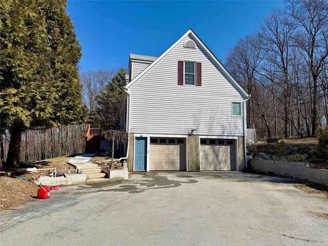 118 White Brg, Middletown, NY 10940 - view of side of property with an attached garage and driveway