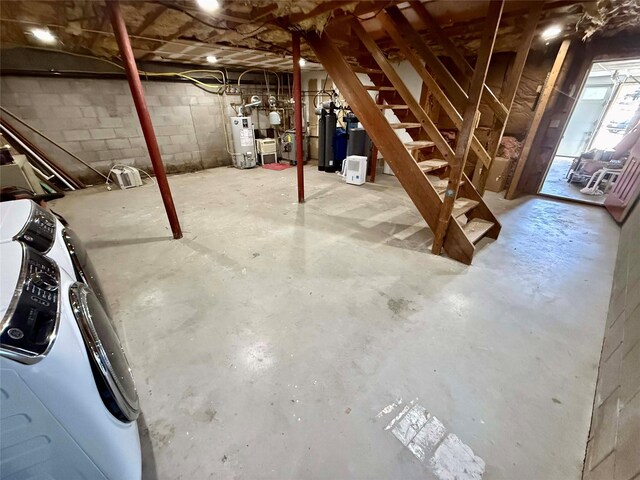 118 White Brg, Middletown, NY 10940 - basement featuring separate washer and dryer, water heater, stairs, and concrete block wall