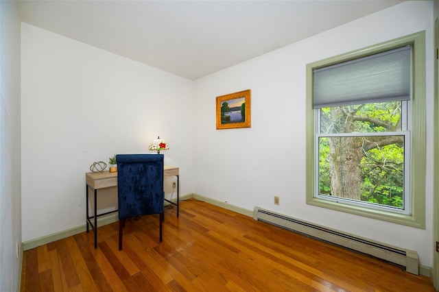 252 Rokeby Rd, Red Hook, NY 12571 - office with a baseboard radiator, wood finished floors, and baseboards