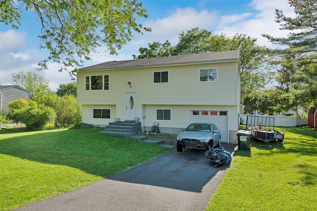 19 Decker Dr, Washingtonville, NY 10992 - view of front of house with asphalt driveway and a garage