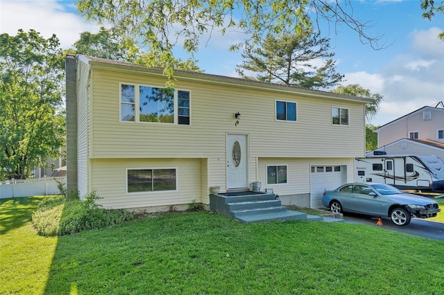 19 Decker Dr, Washingtonville, NY 10992 - bi-level home featuring an attached garage, a chimney, and driveway
