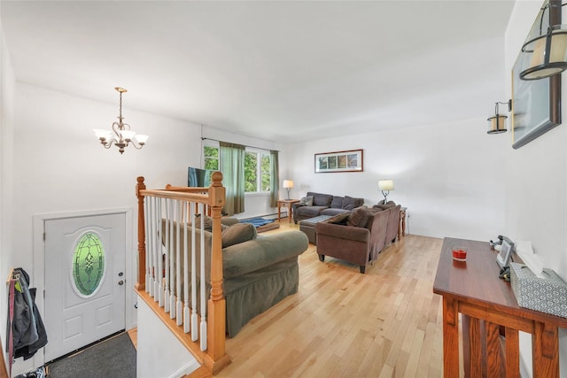 19 Decker Dr, Washingtonville, NY 10992 - living area featuring light wood-style flooring and a chandelier