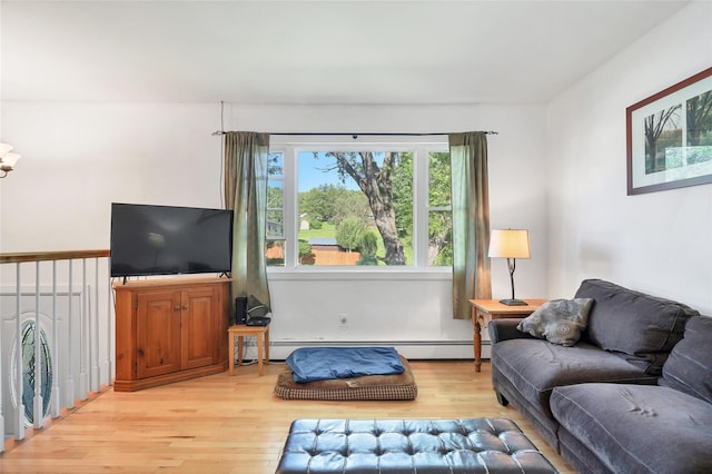 19 Decker Dr, Washingtonville, NY 10992 - living room featuring light wood-style floors and baseboard heating