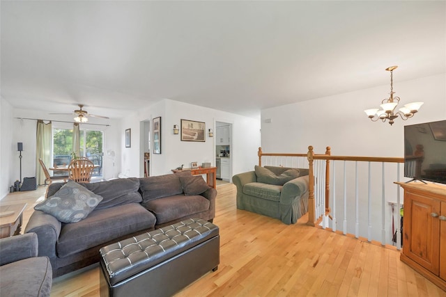 19 Decker Dr, Washingtonville, NY 10992 - living room featuring a chandelier, light wood-type flooring, and a ceiling fan