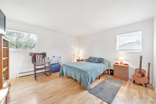19 Decker Dr, Washingtonville, NY 10992 - bedroom featuring light wood finished floors and baseboard heating