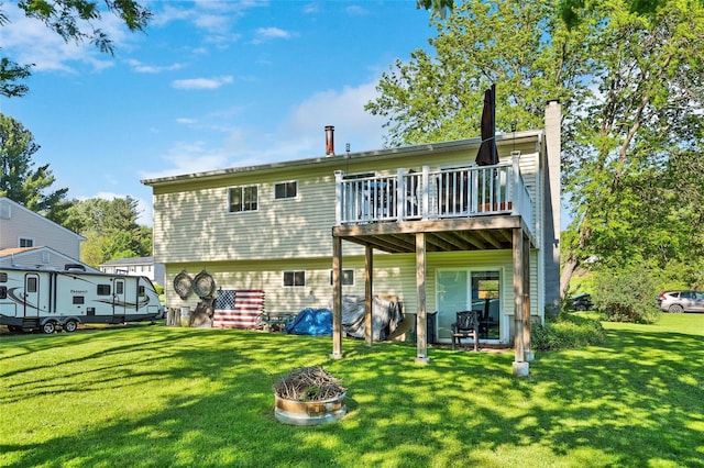 19 Decker Dr, Washingtonville, NY 10992 - back of house with a yard, a chimney, and a wooden deck