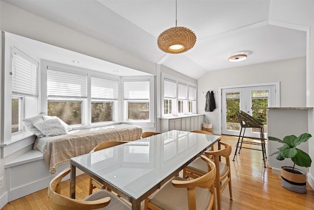 162 Lake Dr, Lake Peekskill, NY 10537 - dining room with light wood-type flooring, lofted ceiling, french doors, and baseboards