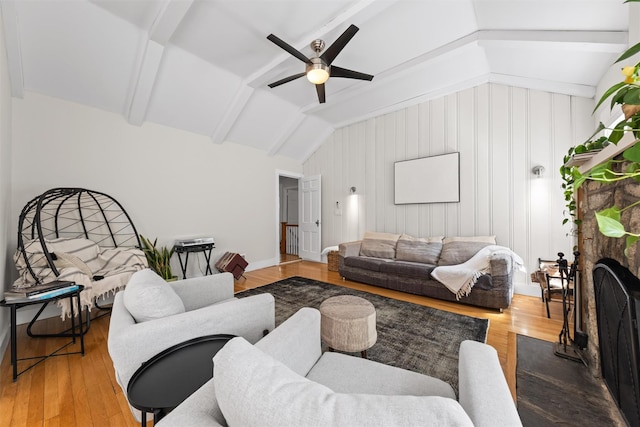 162 Lake Dr, Lake Peekskill, NY 10537 - living area with ceiling fan, wood finished floors, and a fireplace