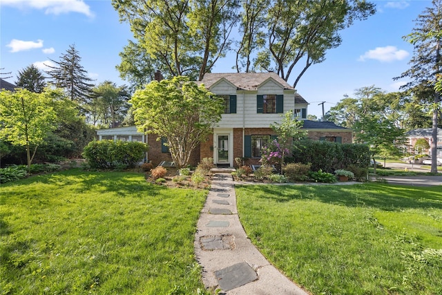 119 Knickerbocker Rd, Manhasset, NY 11030 - view of front of home featuring brick siding and a front yard