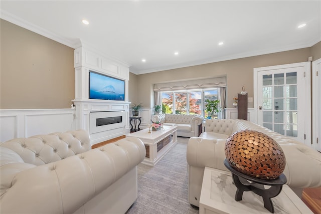 3 Deb St, Plainview, NY 11803 - living room with ornamental molding, a decorative wall, recessed lighting, a wainscoted wall, and a fireplace