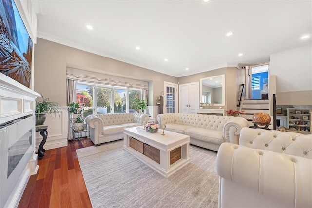 3 Deb St, Plainview, NY 11803 - living area with recessed lighting, ornamental molding, a baseboard heating unit, stairs, and wood finished floors