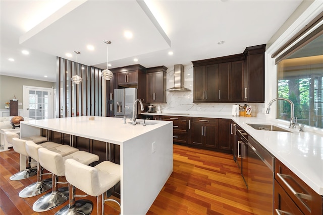 3 Deb St, Plainview, NY 11803 - kitchen featuring wall chimney exhaust hood, a sink, plenty of natural light, a kitchen island with sink, and recessed lighting