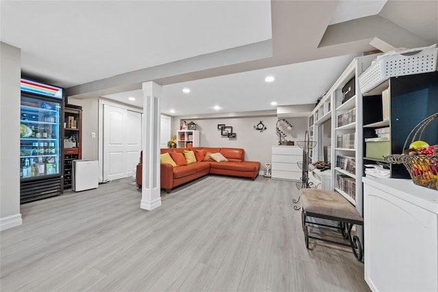 3 Deb St, Plainview, NY 11803 - living area with light wood-type flooring, recessed lighting, decorative columns, and baseboards