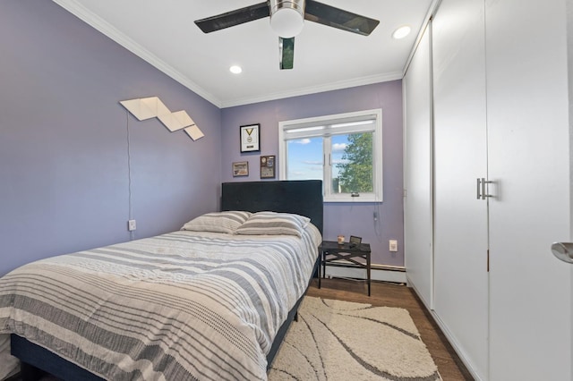 3 Deb St, Plainview, NY 11803 - bedroom featuring a baseboard heating unit, wood finished floors, ornamental molding, recessed lighting, and baseboards