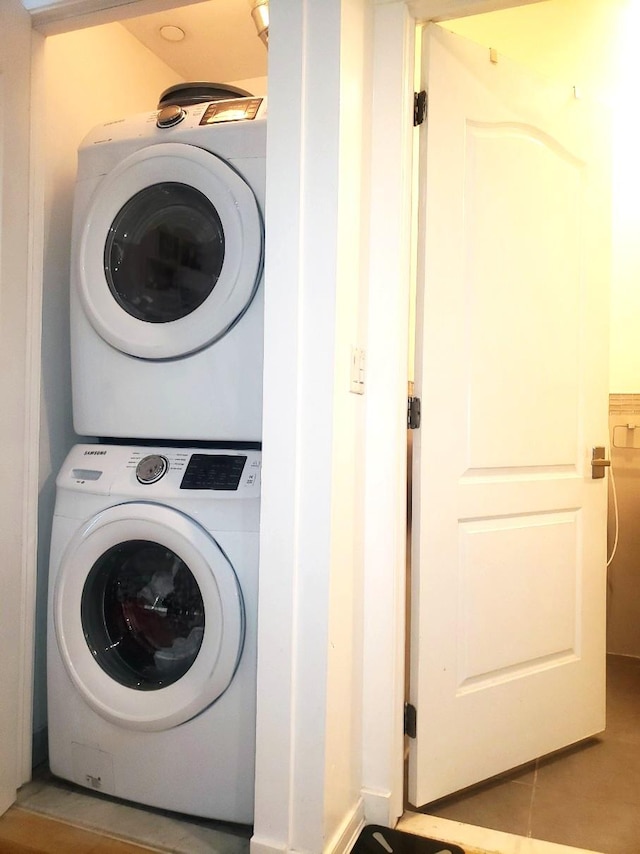 2311 21st Ave Unit 3C, Astoria, NY 11105 - washroom with stacked washer / dryer