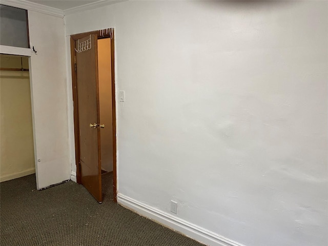 1646 Troy Ave, Brooklyn, NY 11234 - unfurnished bedroom featuring dark colored carpet, baseboards, and crown molding