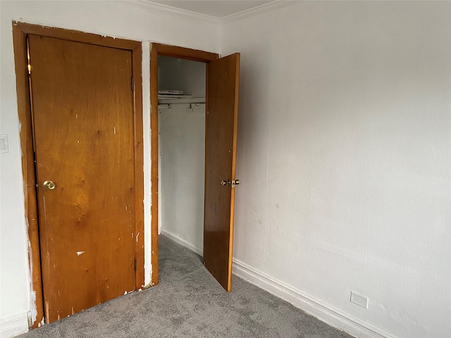 1646 Troy Ave, Brooklyn, NY 11234 - unfurnished bedroom featuring carpet, crown molding, a closet, and baseboards