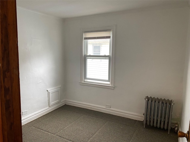 1646 Troy Ave, Brooklyn, NY 11234 - unfurnished room featuring radiator, baseboards, and ornamental molding