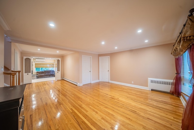 5 Forest Rd, Valley Stream, NY 11581 - unfurnished living room with radiator heating unit, crown molding, baseboard heating, recessed lighting, and light wood-type flooring