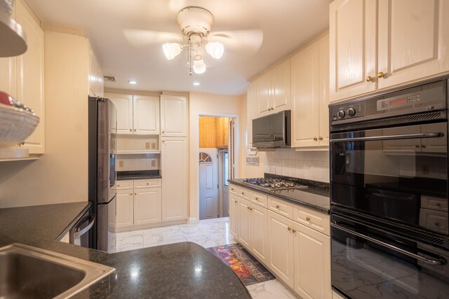 5 Forest Rd, Valley Stream, NY 11581 - kitchen featuring light marble finish flooring, appliances with stainless steel finishes, a ceiling fan, recessed lighting, and tasteful backsplash