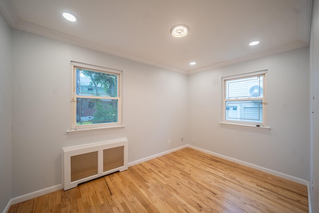 5 Forest Rd, Valley Stream, NY 11581 - unfurnished room with ornamental molding, light wood finished floors, baseboards, and recessed lighting